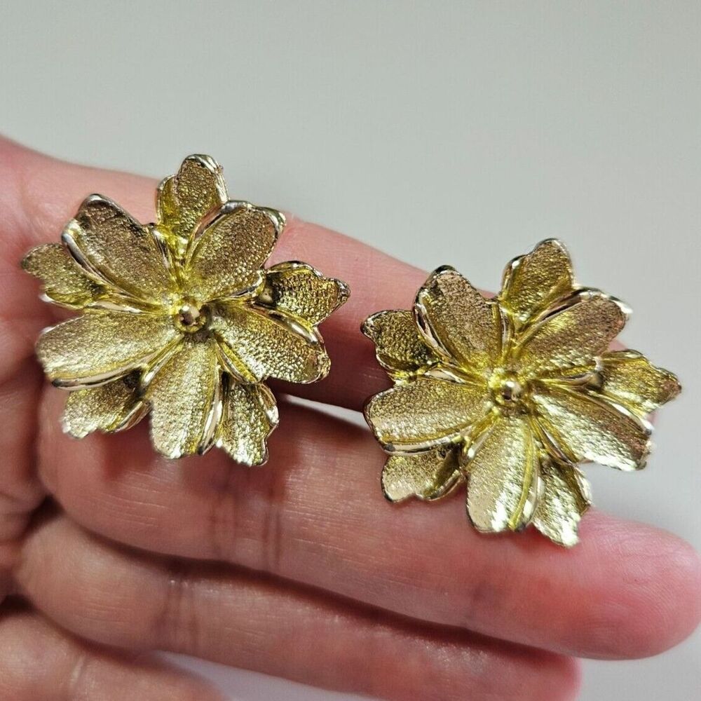 Gold tone floral clip on earrings